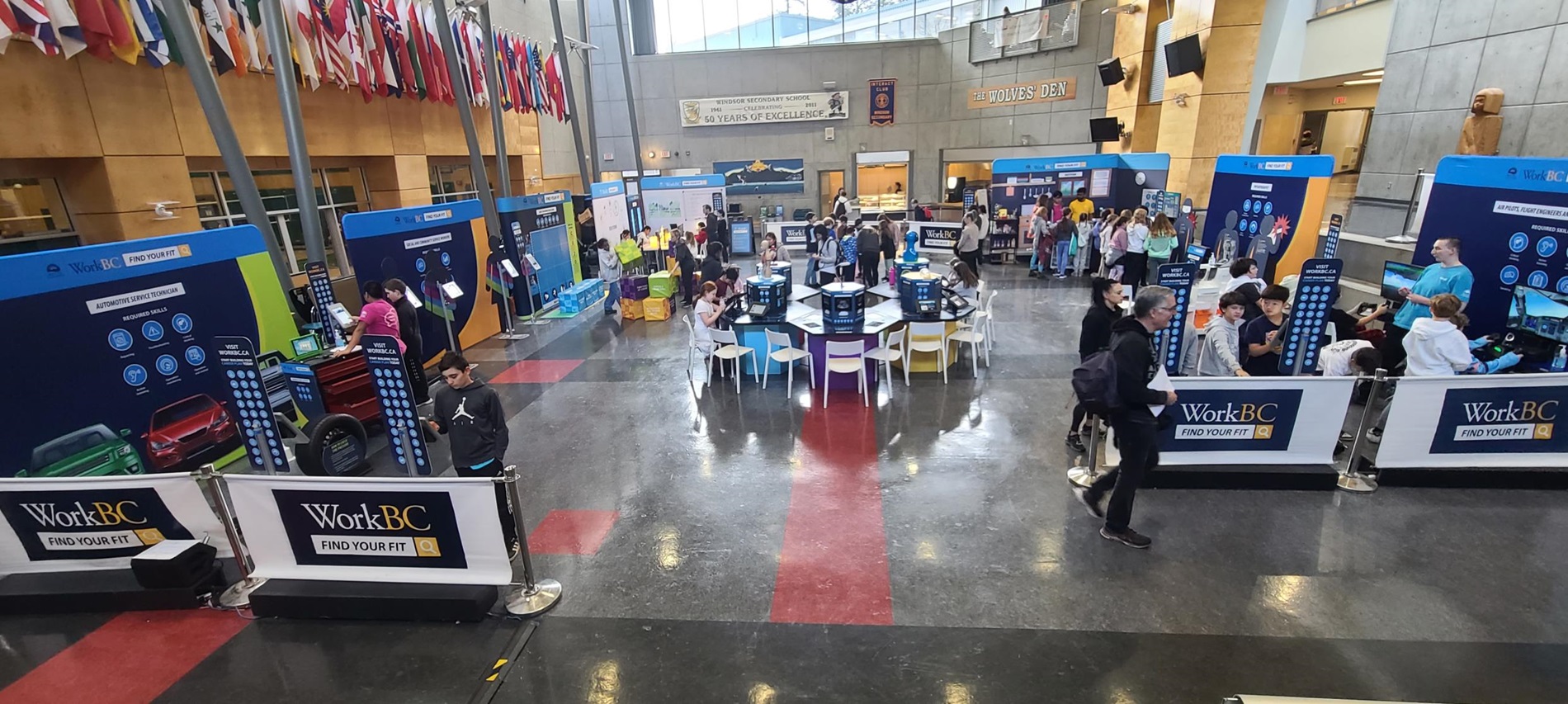 Students at a Find Your Fit Tour event with interactive stations