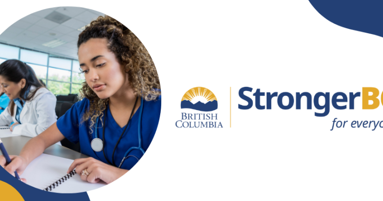 A female nurse in blue scrubs studying. To her right is the StrongerBC logo with a blue and yellow colour pattern.