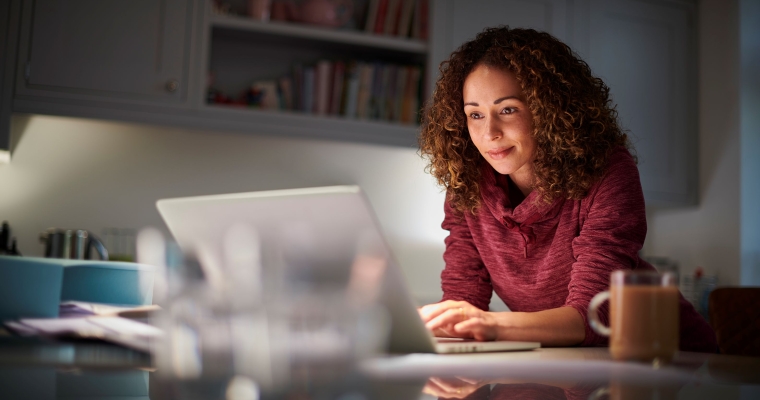 mature student studying on laptop