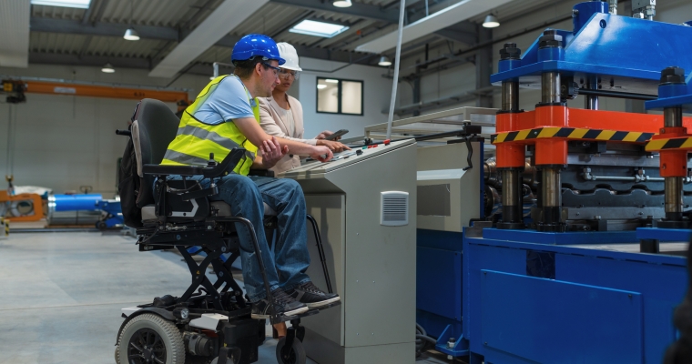 female manager training employee with a disability