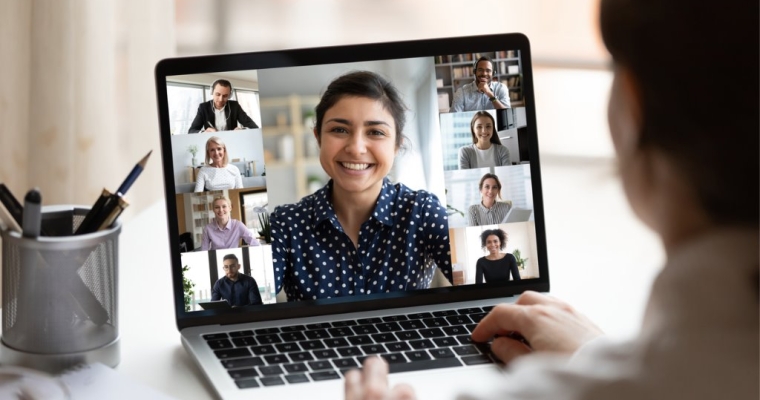 group video call with multiple people on laptop screen