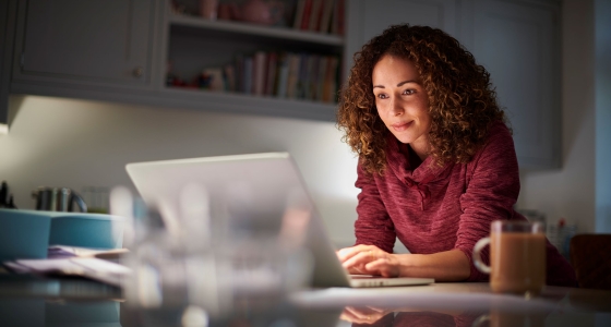 mature student studying on laptop