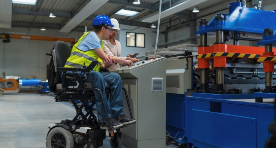 female manager training employee with a disability