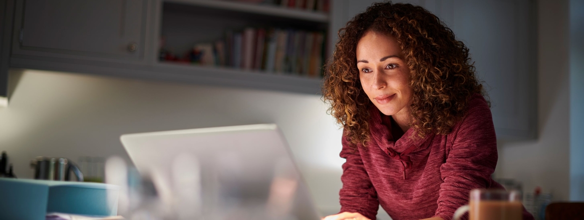 mature student studying on laptop