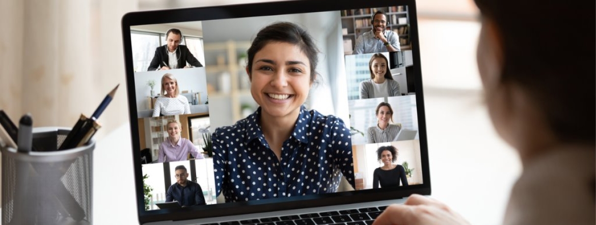 group video call with multiple people on laptop screen