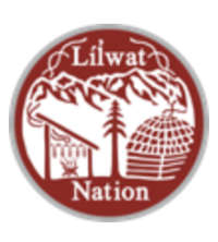 lilwat nation logo, tree, houses in front of a mountain