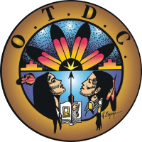 OTDC logo, two people underneath feathers