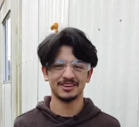 Man wearing safety glasses
