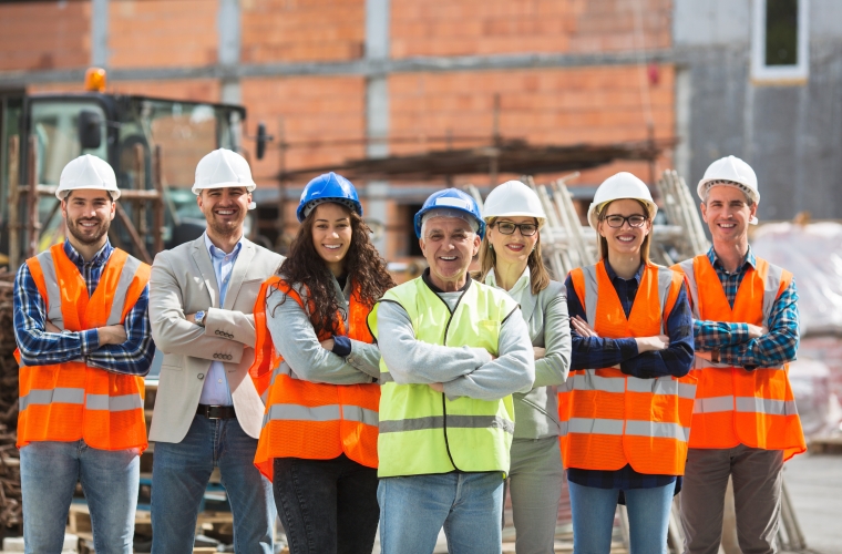 diverse group of trade workers and apprentices