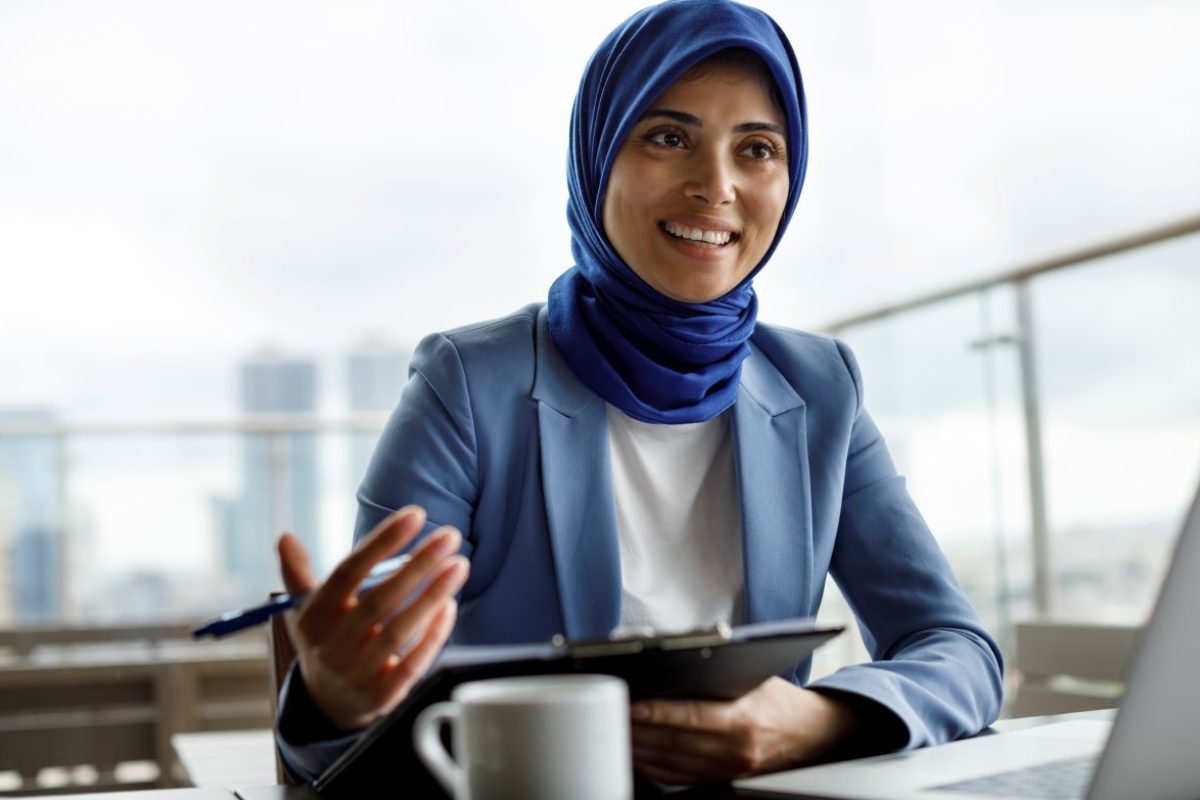 woman wearing a hijab in a business meeting