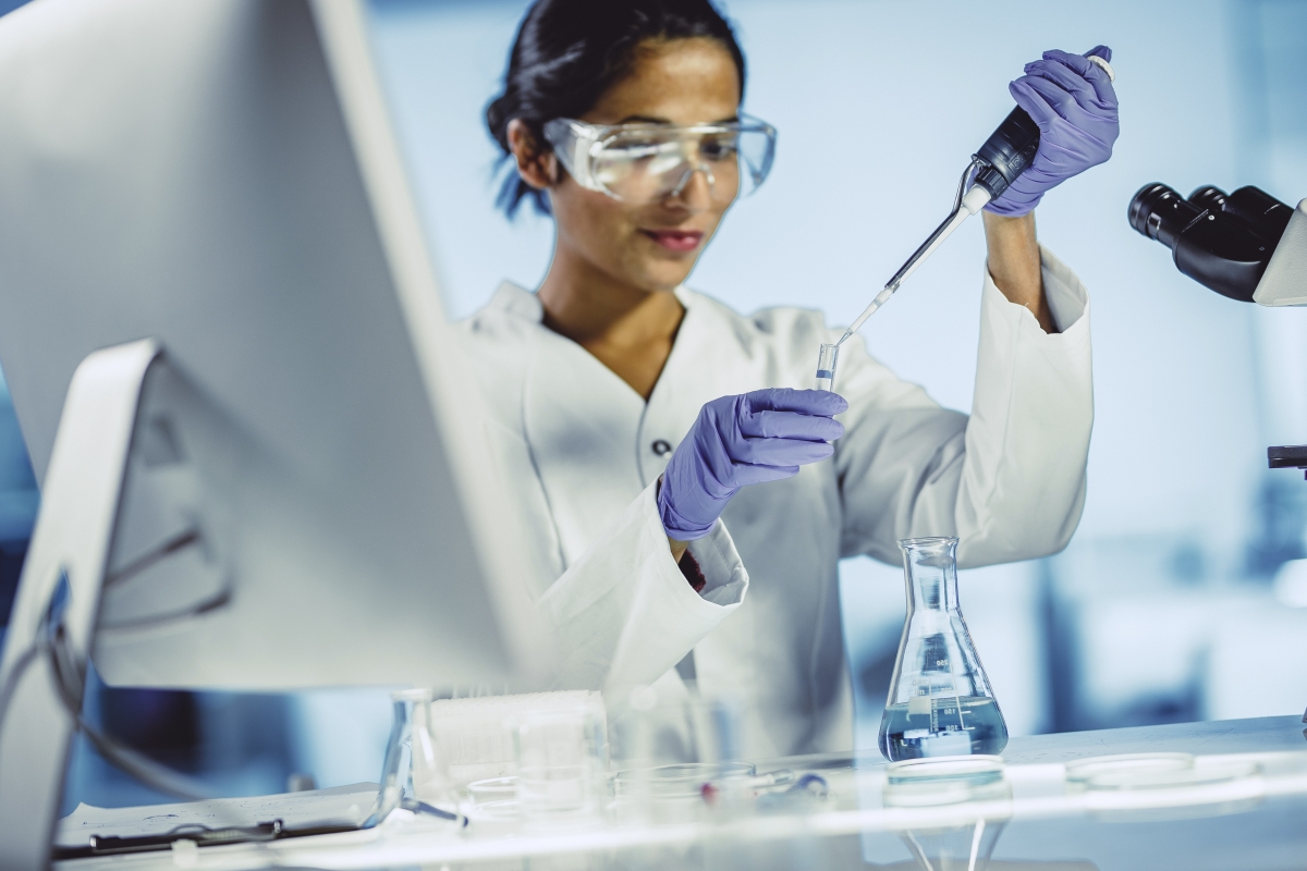 Young female scientist working in a laboratory 