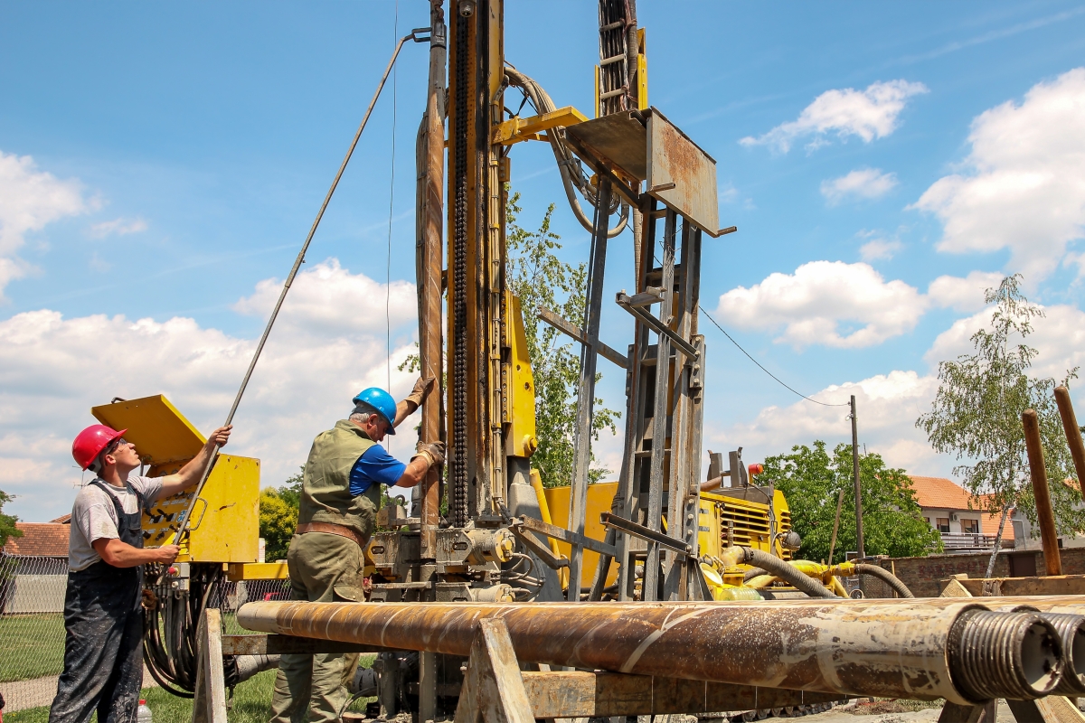 workers using heavy equipment