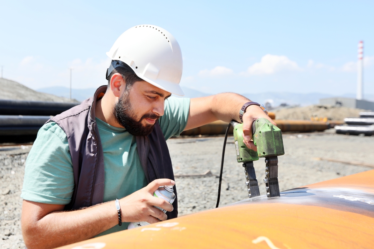 bipoc male drilling onsite